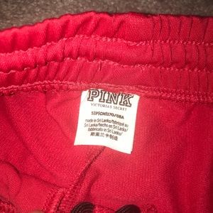 VS Pink skinny red joggers with zippers on ankle